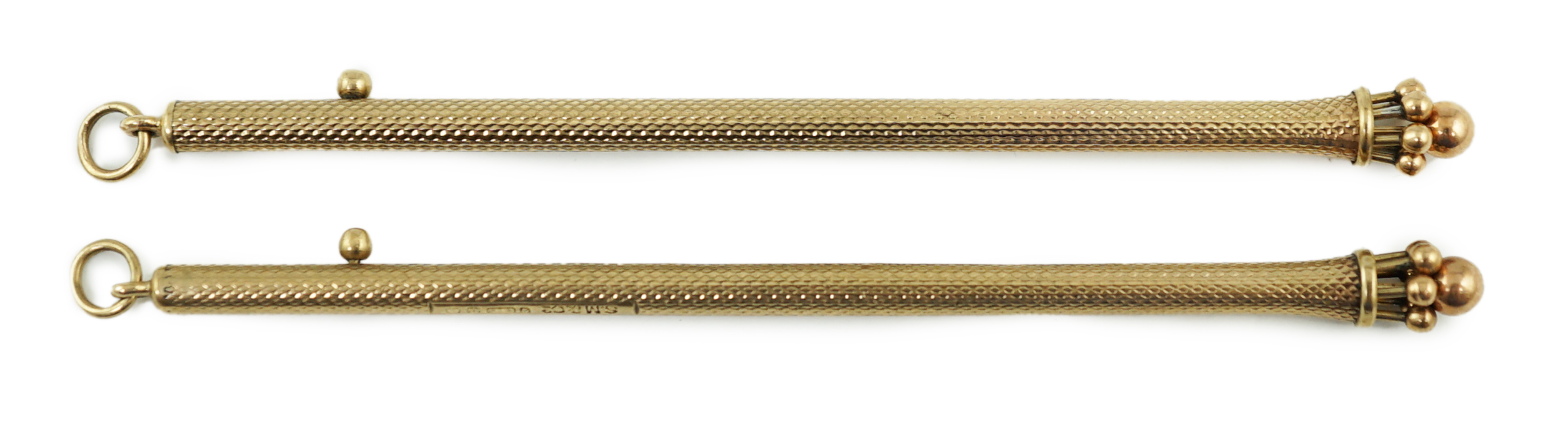 A pair of George V engine turned 9ct gold swizzle sticks, by Sampson Mordan & Co, London, 1934